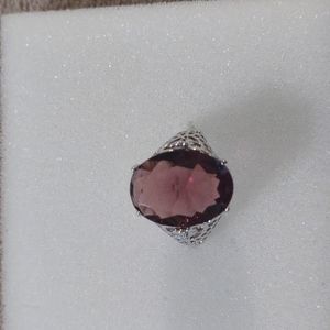 Sterling silver ring with artificial stones. Approx size 8. EUC No box. No tags.